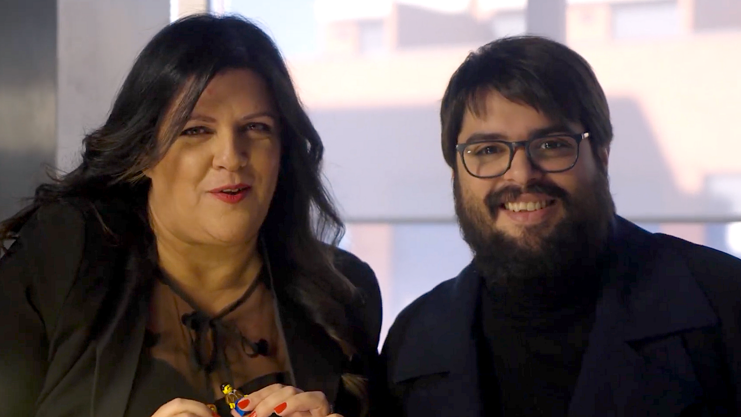 Coria Castillo y Brays Efe en el vídeo promocional de la AICE